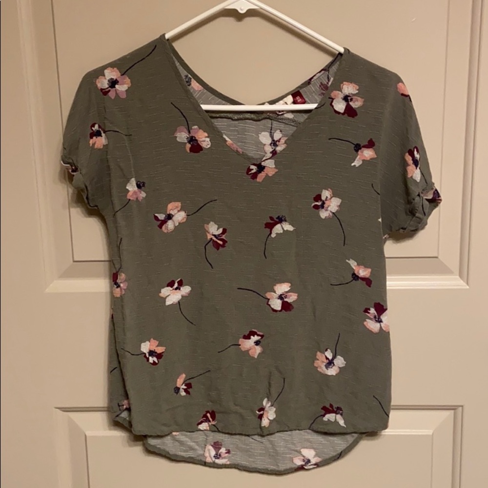 Green shirt with floral print